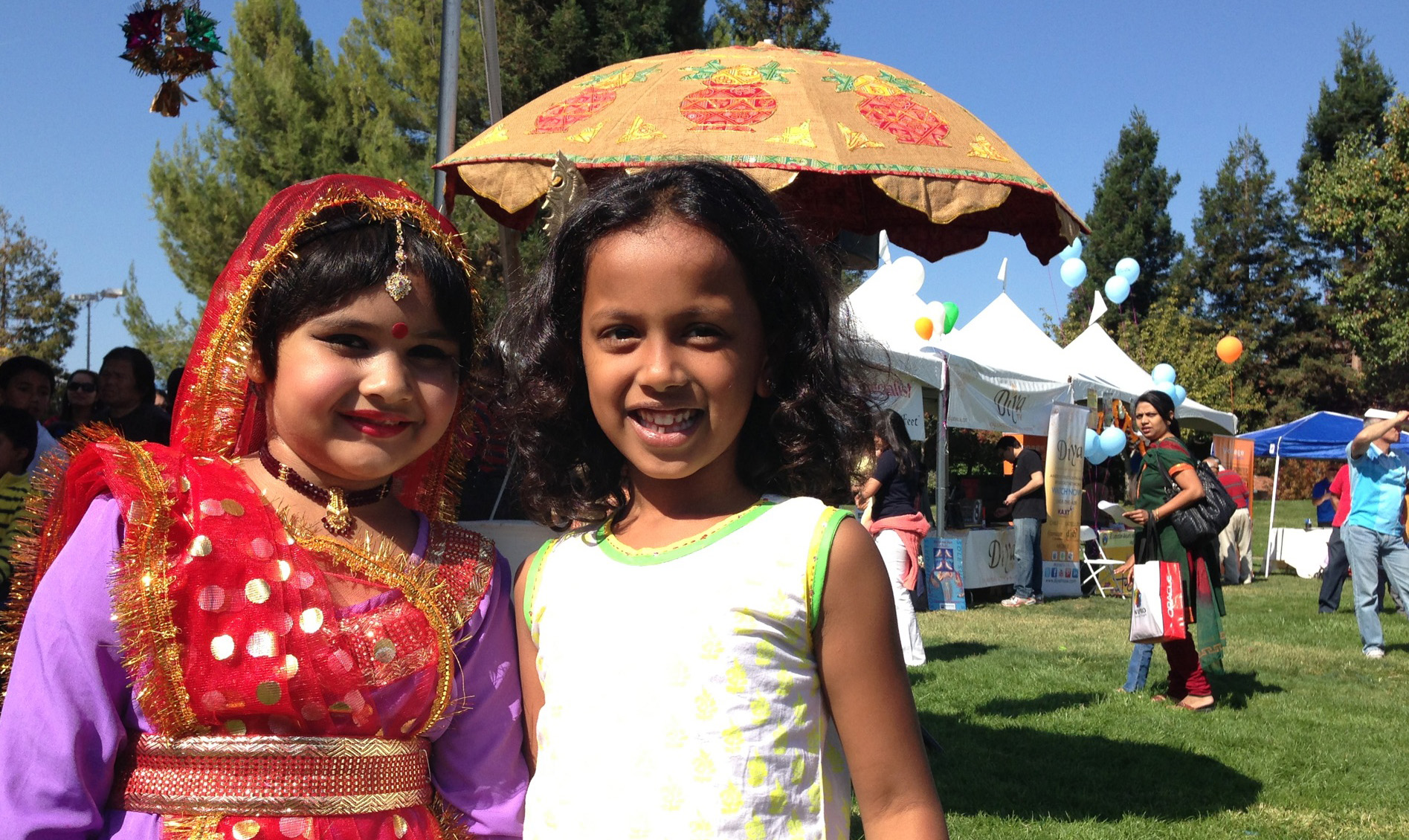 Dancers relax after performing during a Diwali Festival in Silicon Valley Dancers relax after performing during a Diwali Festival in Silicon Valley